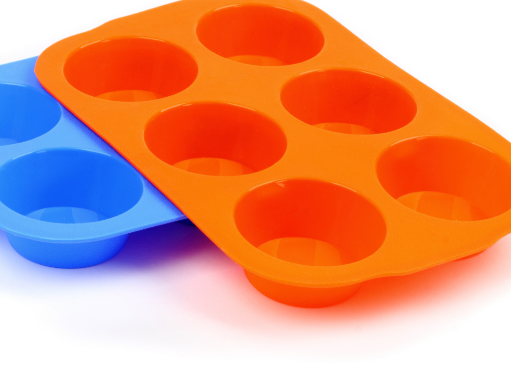 two silicone muffin tins