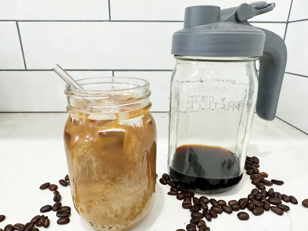 cup of cold brew coffee with cold brew immersion device