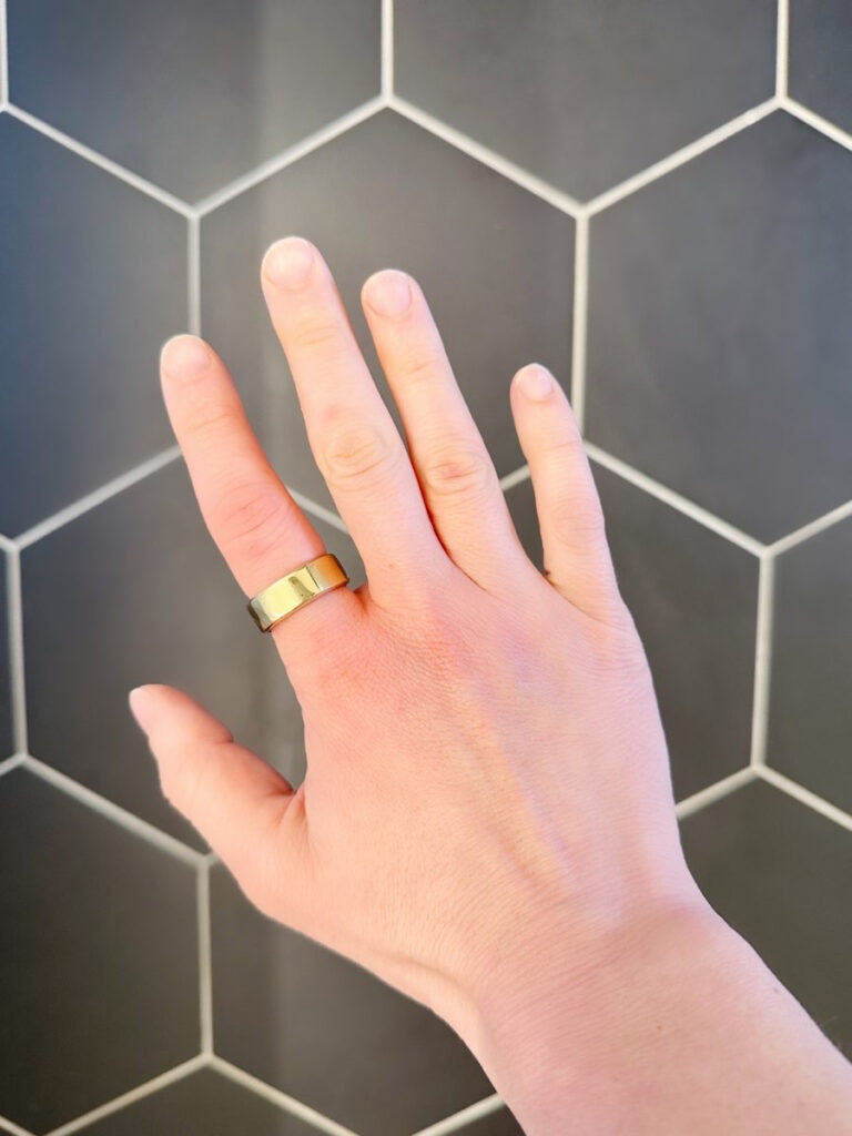 woman wearing oura ring